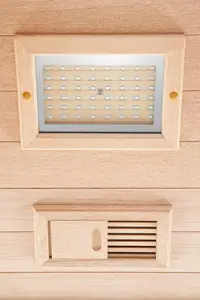 Chromotherapy LED light and air vent inside HealthMate Serenity 3 infrared sauna.