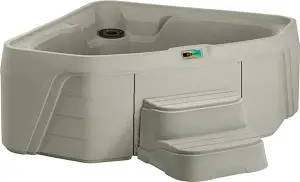 Fantasy Spas Embrace hot tub in sand color, front view with integrated steps.