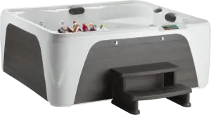 Front view of the Fantasy Spas Entice Premier in Arctic White shell with Charcoal cabinet.