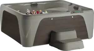 Front view of the Fantasy Spas Entice Premier in Taupe shell with Espresso cabinet.
