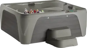 Front view of the Fantasy Spas Entice Premier in Taupe shell with Charcoal cabinet.