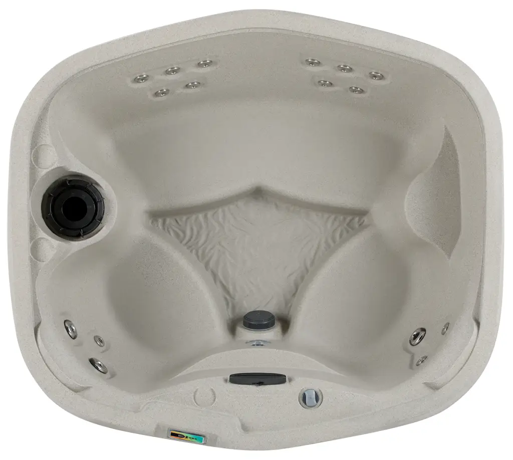 Overhead view of the Fantasy Spas Drift hot tub in sand color with round seating and multiple massage jets