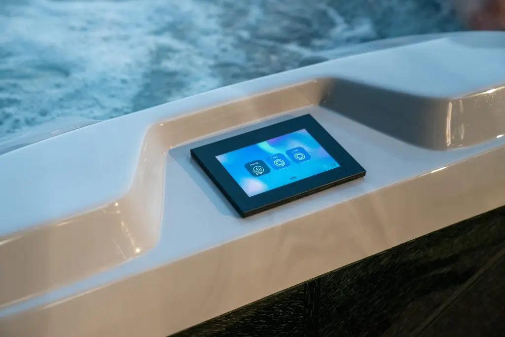 Sundance 880 Series hot tub control panel integrated into the spa shell at Blackthorne Spas