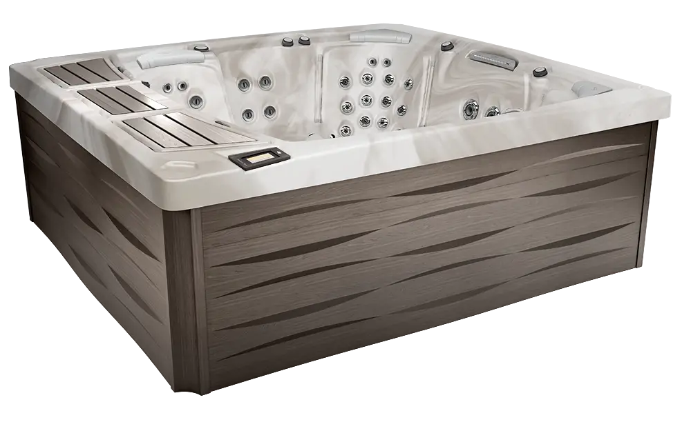 Sundance 980 Series Claremont hot tub with open seating, jet layout, and exterior cabinet