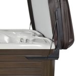 Leisure Concepts CoverMate Zero hot tub cover lift mounted to spa cabinet