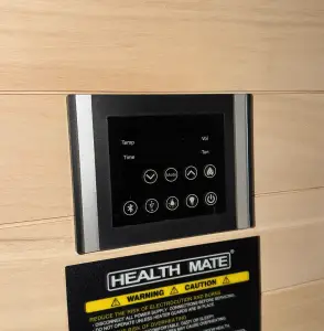 Interior control panel inside Health Mate Serenity 2 and Serenity 3 infrared sauna with touch controls mounted on wood wall.